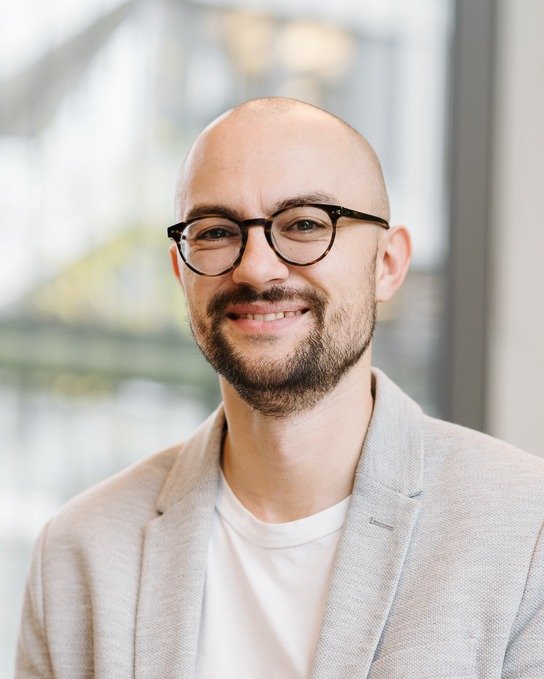 Portrait eines Mitarbeiters der Sparkasse KölnBonn