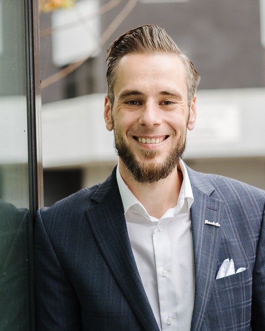 Portrait eines Mitarbeiters der Sparkasse KölnBonn